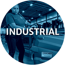 The word "industrial" over a photo of a Level Seven worker cleaning a factory floor